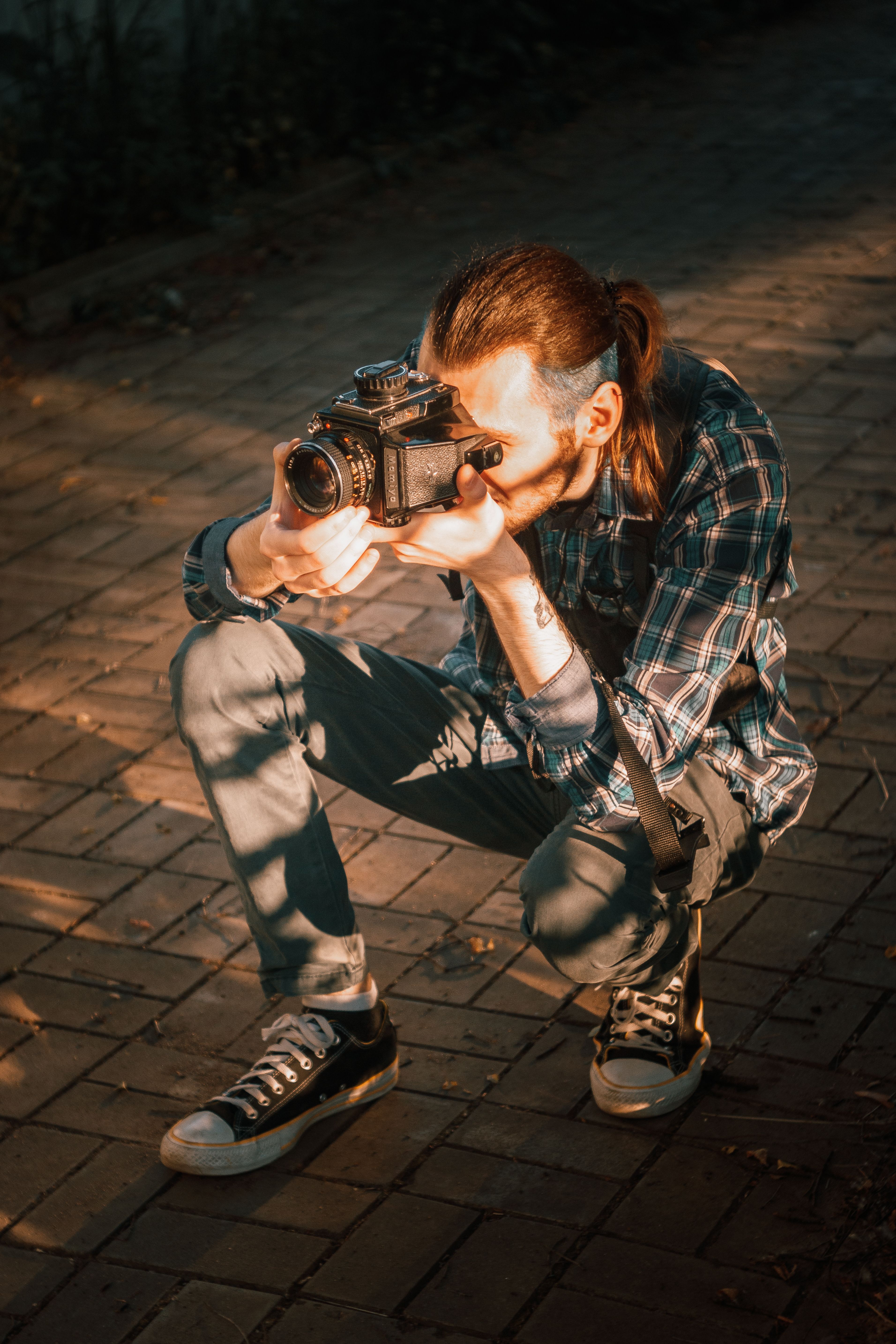 Zdjęcie pracującego fotografa